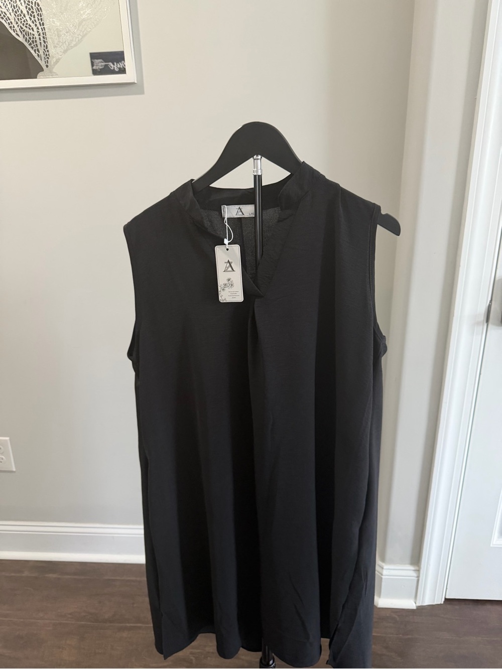 Sleeveless Black Mini Dress with V-Notch Neckline